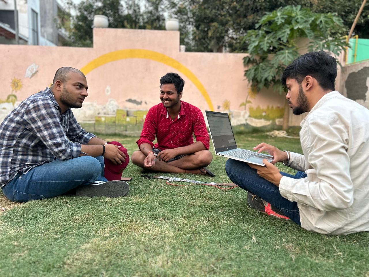 The team discussing blueprints