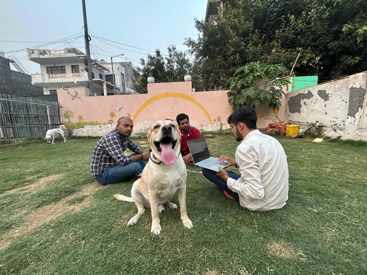 A happy pet with one of the founders